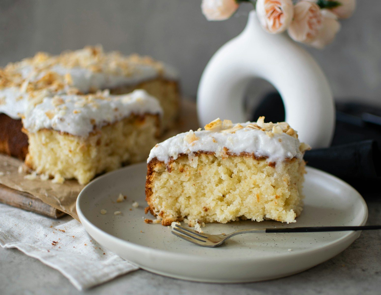 a piece of cake on a plate with a fork